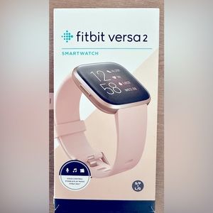 Fitbit Versa 2 - like new.  Includes charger.  Health & fitness smartwatch.